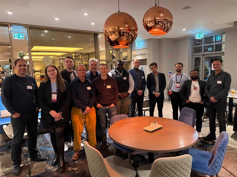 CTO Talks participants standing together after a discussion on AI agents, ROI, and scalable systems.
